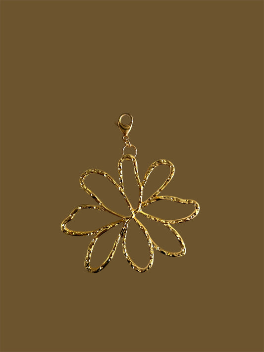 Charm flor dorada