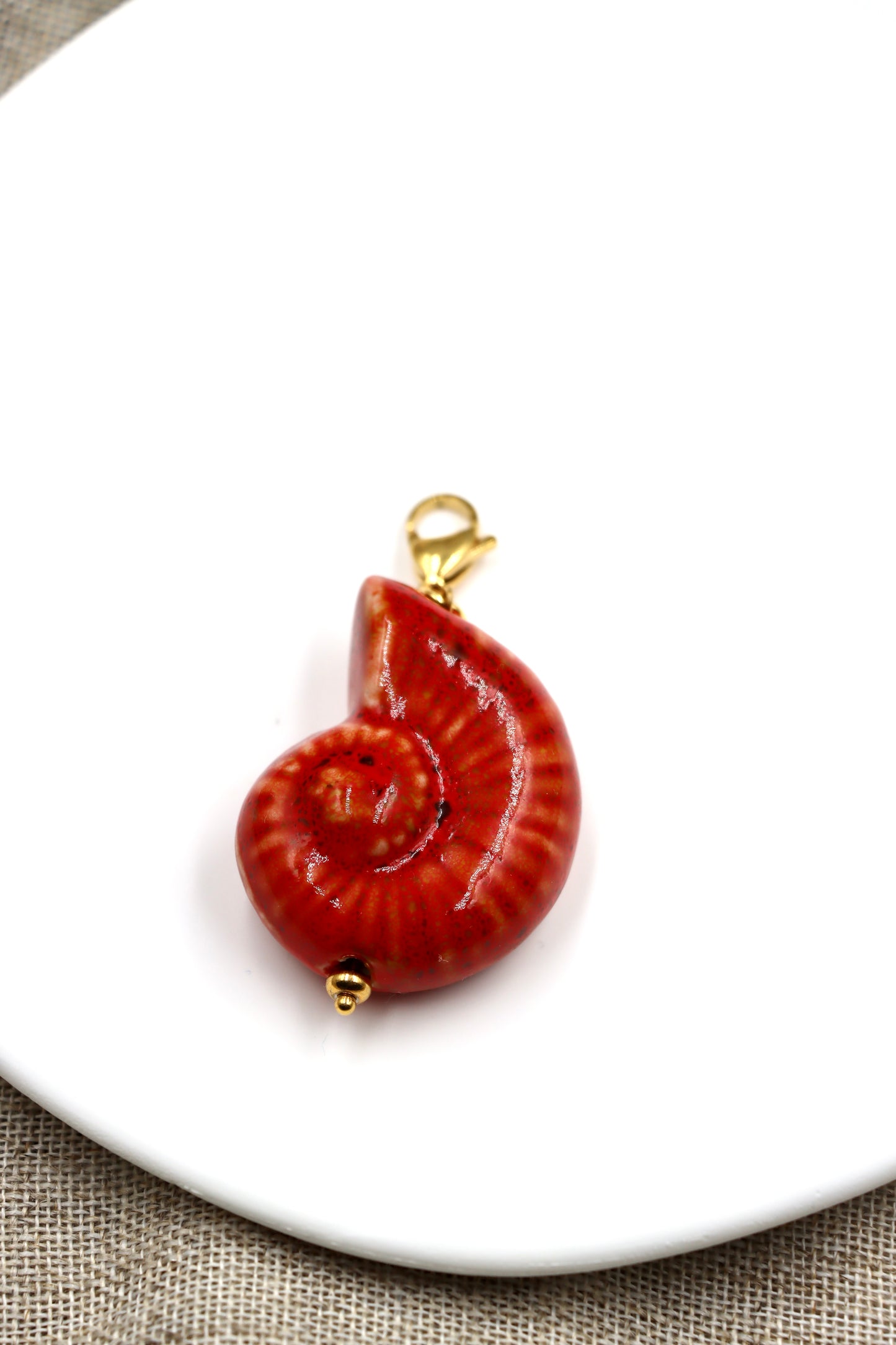 Charm Caracola Roja
